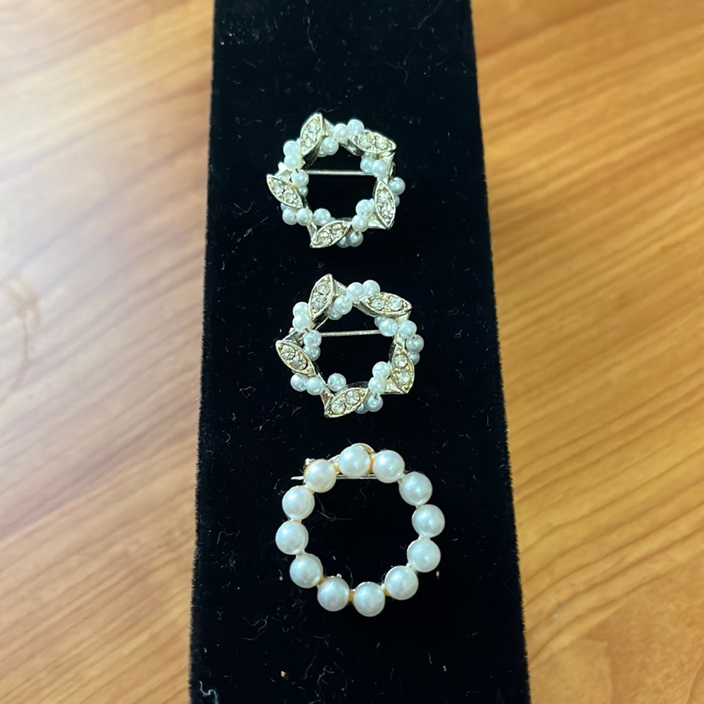 Three beautiful brooches with accents. No marks